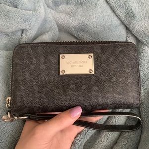 Grey and black Michael Kors zipper wallet